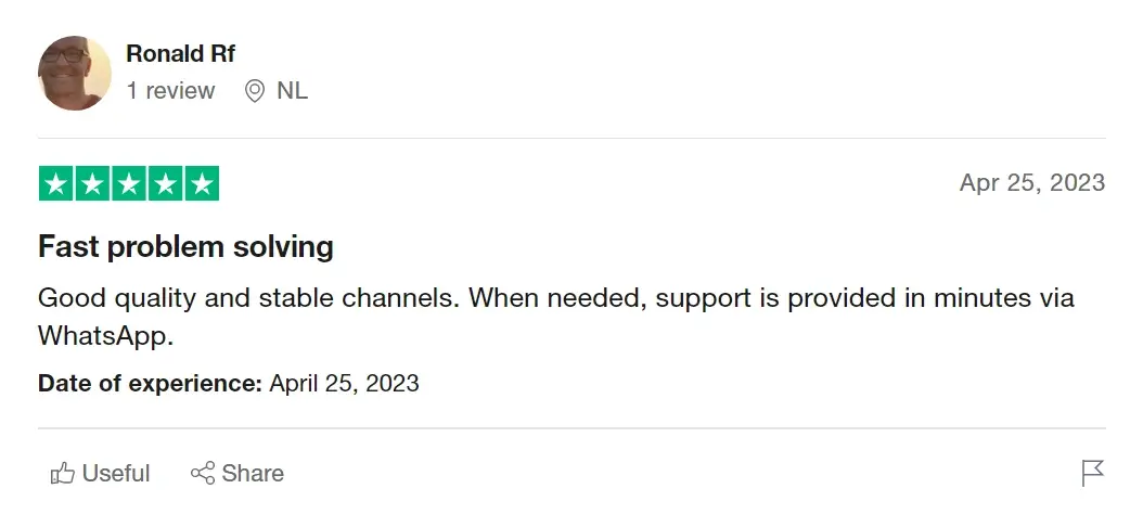 A Trustpilot review by Ronald Rf with a 5-star rating. The review title is "Fast problem solving." It mentions good quality and stable channels with support provided via WhatsApp. Date of experience is April 25, 2023. Options to mark the review as useful or share it are visible.